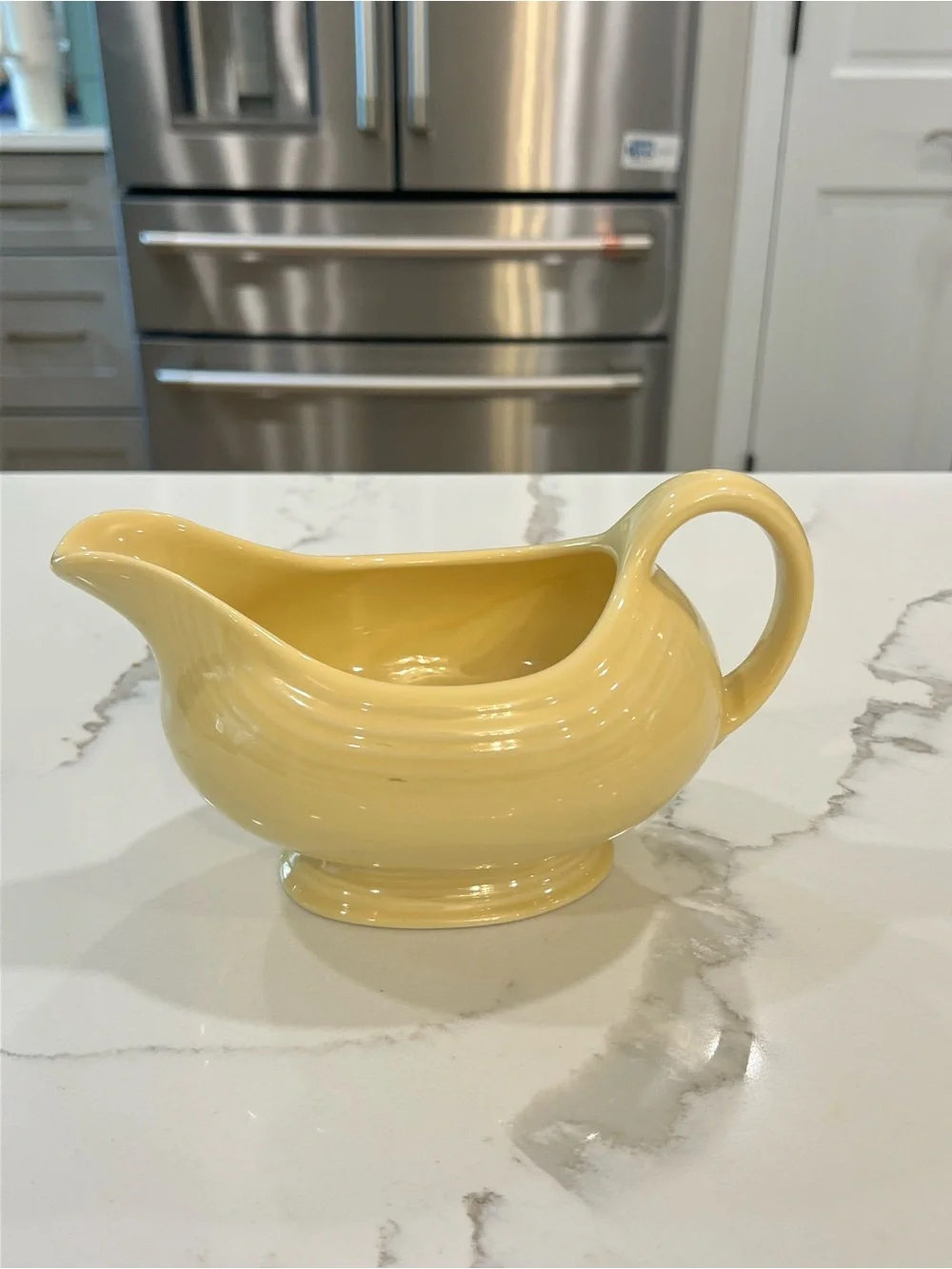 Vintage Fiesta Ware light yellow “sunflower” gravy boat EUC